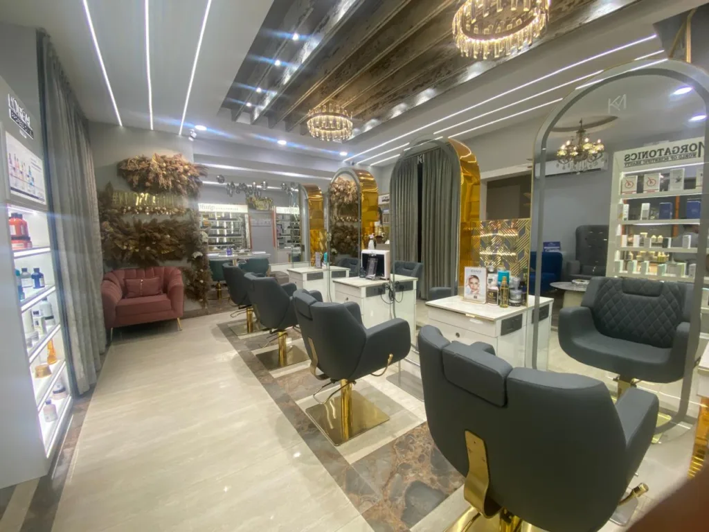 Luxurious Beauty Services at KM Orgatonics Salon & Clinic in Gorakhpur The elegant interior of KM Orgatonics in Gorakhpur, featuring comfortable salon chairs, product displays, and stylish decor, creating a relaxing atmosphere.