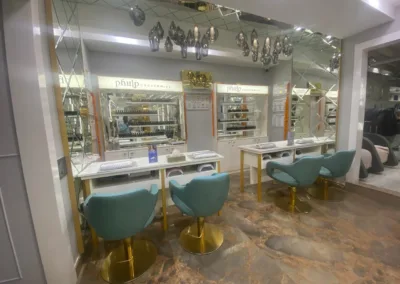 The dedicated nail care station at KM Orgatonics in Gorakhpur, complete with comfortable seating, a wide selection of nail polishes, and a well-lit, hygienic setup.